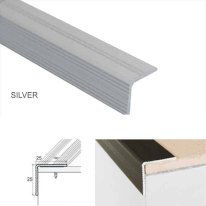 silver aluminium stair nosing fitted to indoor wood stairs