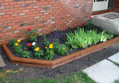 Close-up of wooden timber edging providing a smooth seamless finish